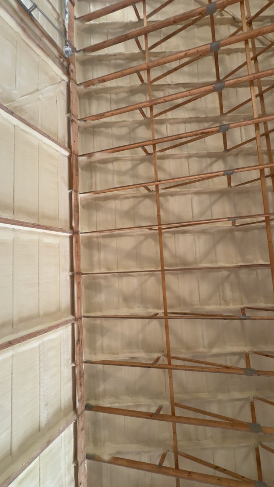 Foam between the roof trusses, up close.